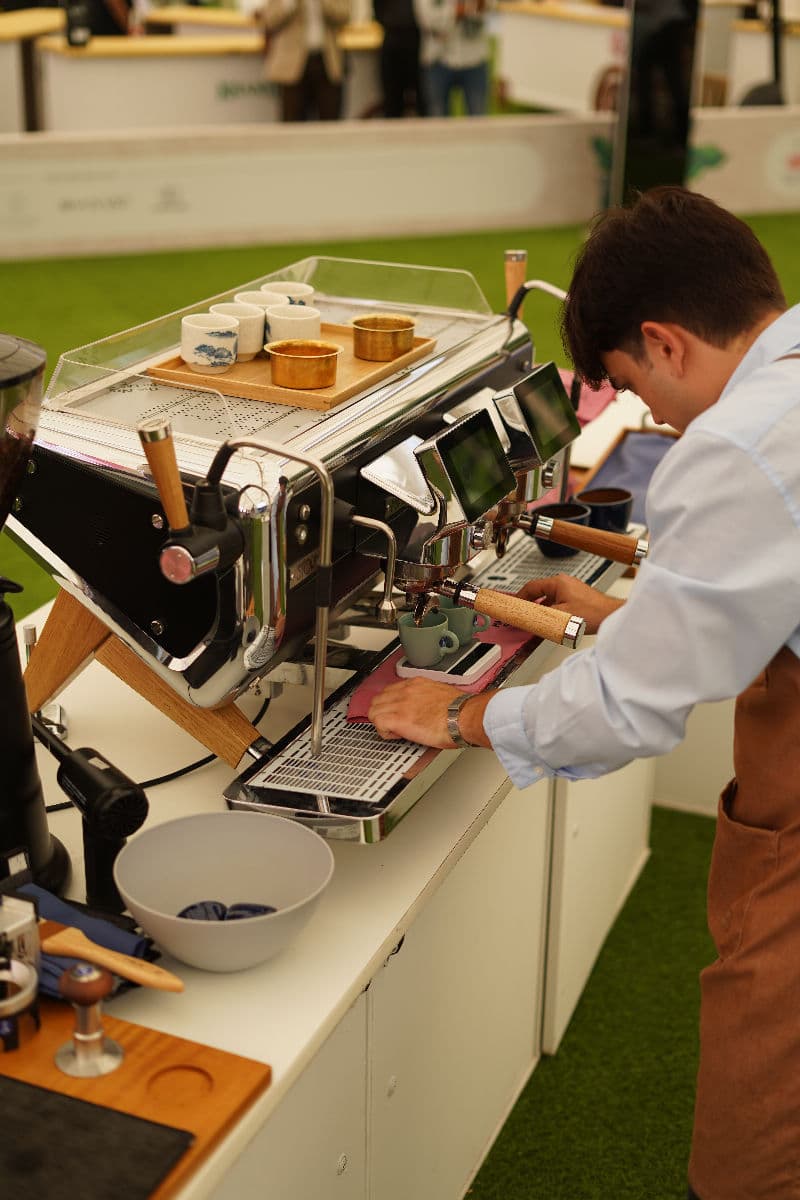 Barista competing at the India International Coffee Festival